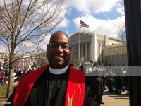MCCDC_DeWayne Davis, a clergy candidate at Metropolitan Community Church of Washington, D.C., said he was "proud" to be standing among supporters of gay marriage outside the Supreme Court as arguments on California's Proposition 8 are heard in Washington on Tuesday, March 26, 2013. (Curtis Tate/MCT) MCCDC_DeWayne Davis, a clergy candidate at Metropolitan Community Church of Washington, D.C., said he was "proud" to be standing among supporters of gay marriage outside the Supreme Court as arguments on California's Proposition 8 are heard in Washington on Tuesday, March 26, 2013. (Curtis Tate/MCT)